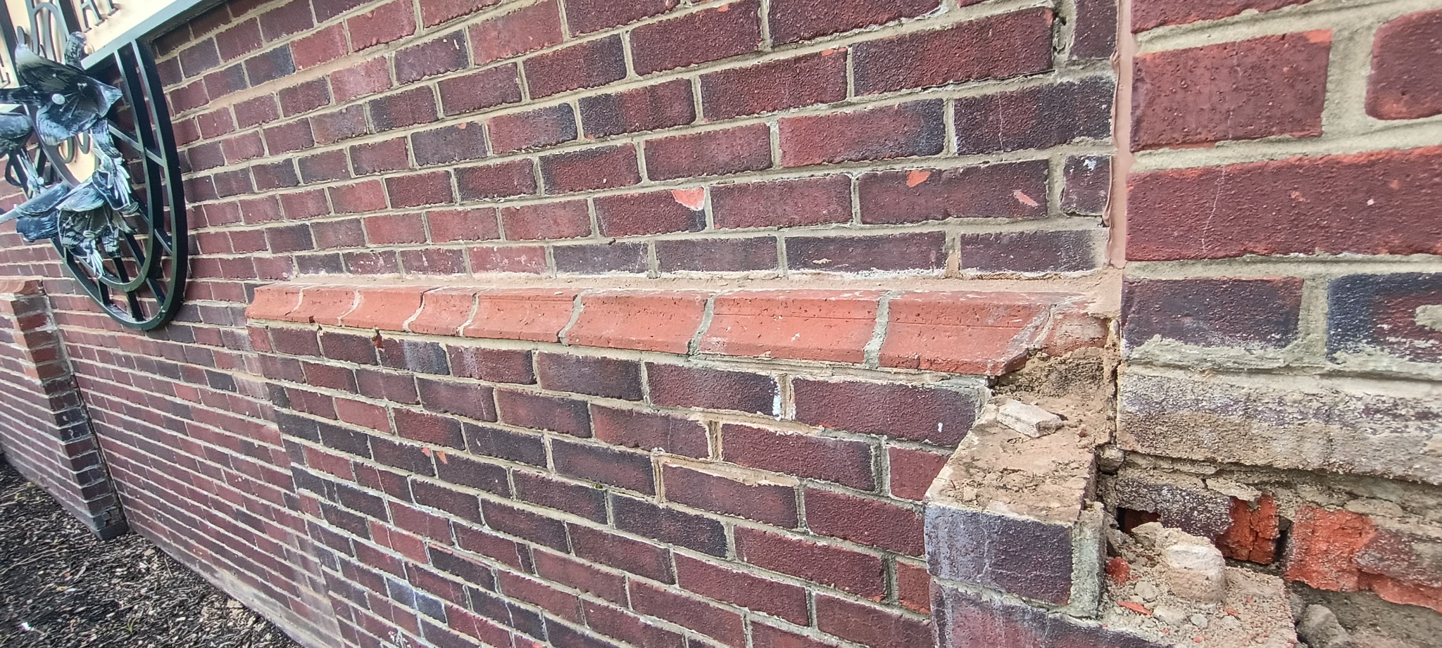 Limestone Ledge Replacement: Deteriorated rowlocks