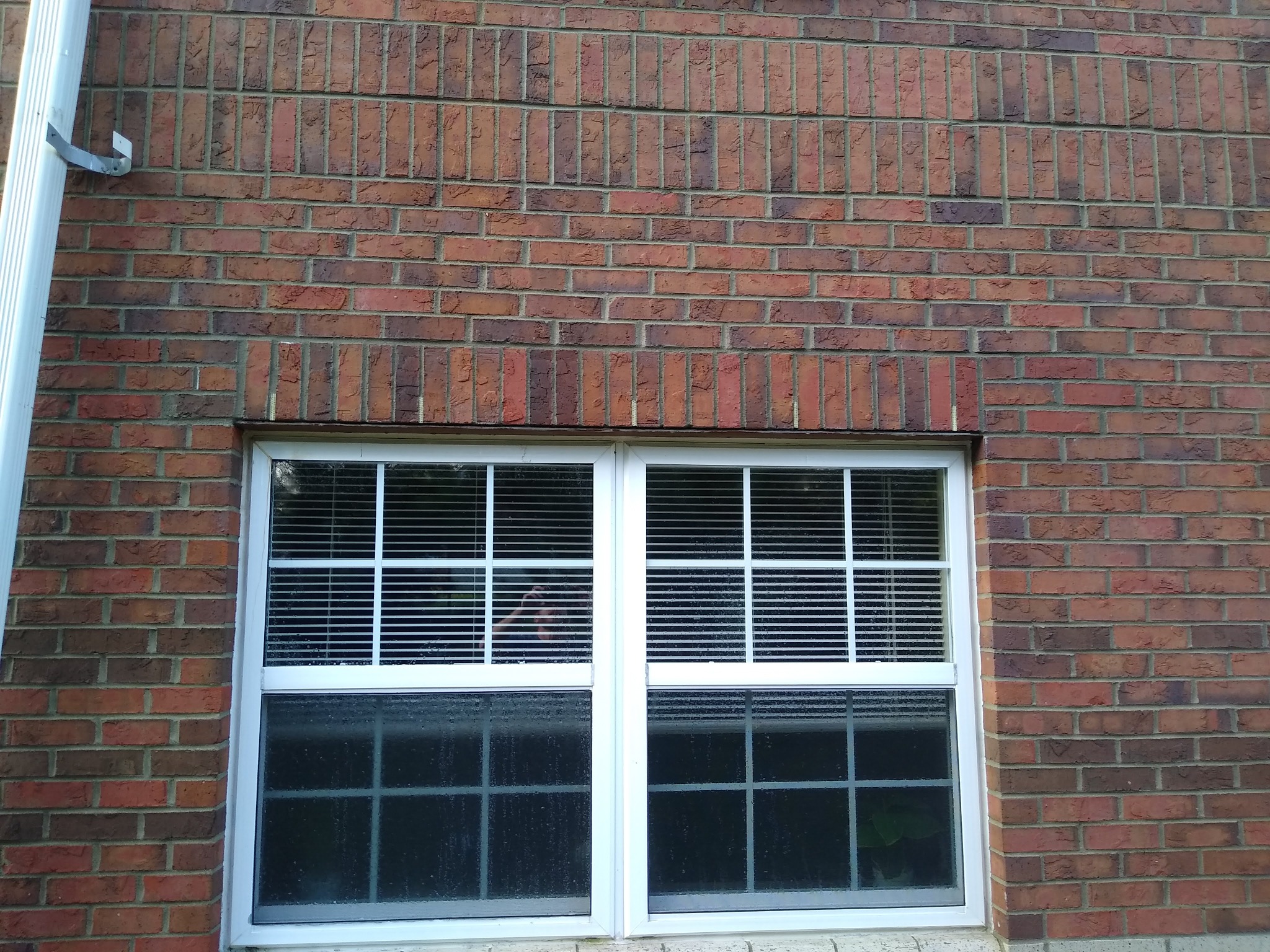 Lintel & Flashing Reconstruction: Brick reinstalled