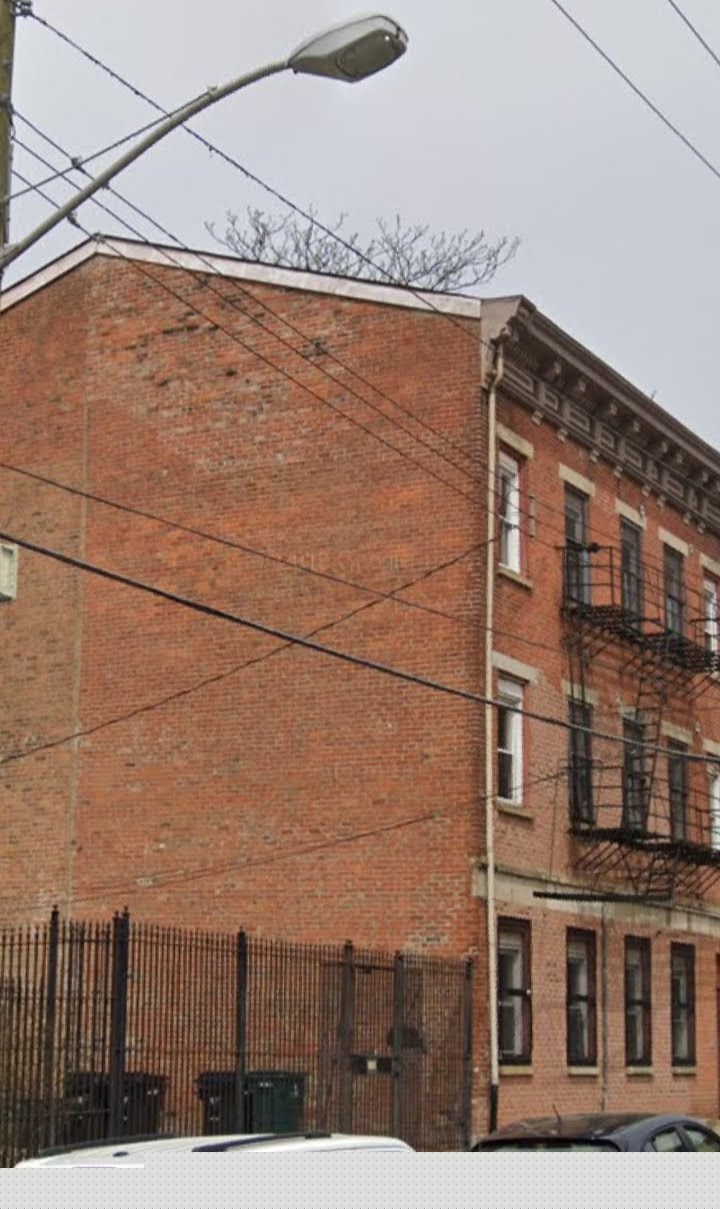 Mass Masonry Wall Reconstruction: Completed elevation