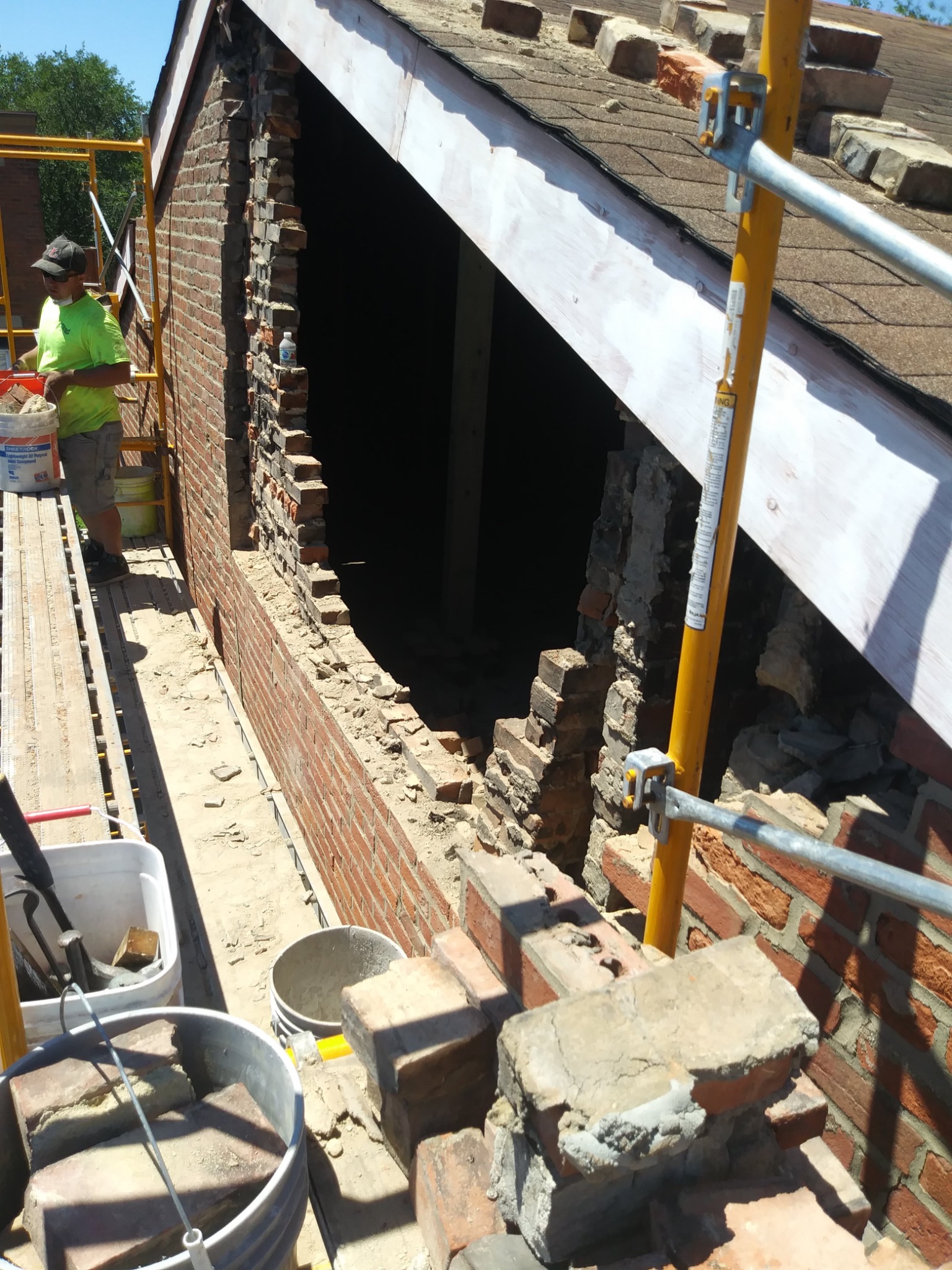 Mass Masonry Wall Reconstruction: Full-depth rebuild
